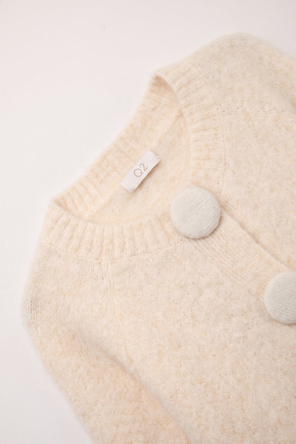 Cream fluffy Knit Round Neck Button Front Cardigan - Premium Cardigans from Q2 - Just $79.90! Shop now at Tooksie