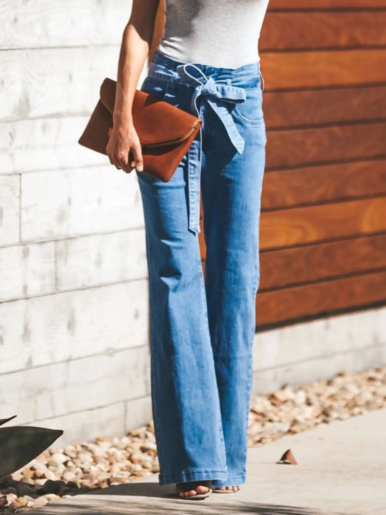 High-Waisted Tie-Front Flared Jeans - Premium variable from Tooksie - Just $50.99! Shop now at Tooksie