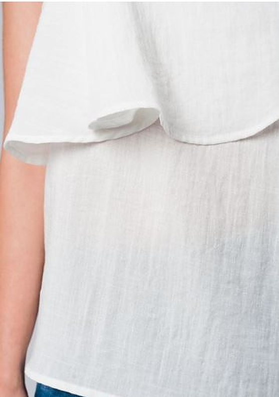 Off White Asymetrical Top - Premium variation from Tooksie - Just $34.99! Shop now at Tooksie