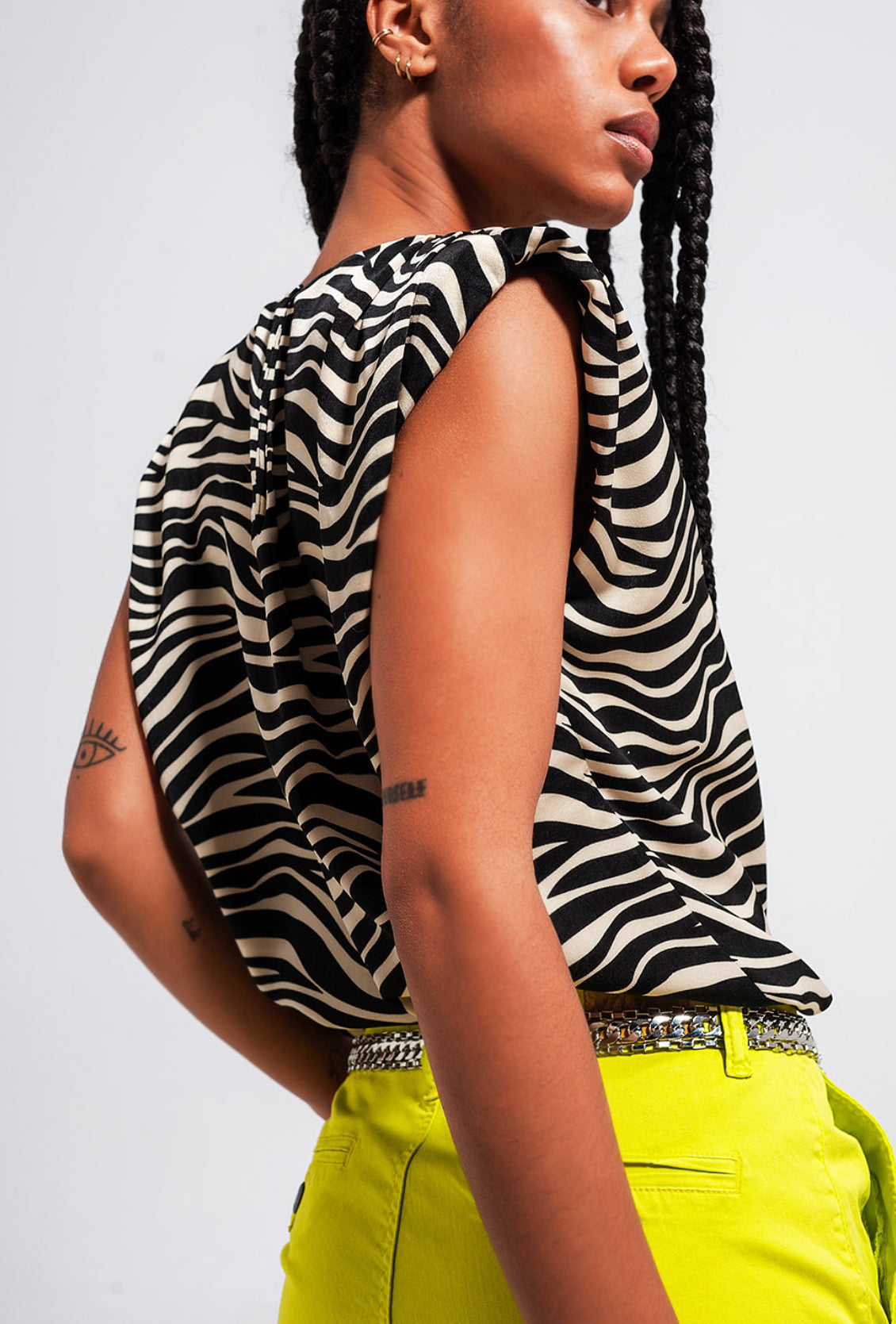 Zebra Print Sleeveless Top - Premium variable from Tooksie - Just $39.99! Shop now at Tooksie