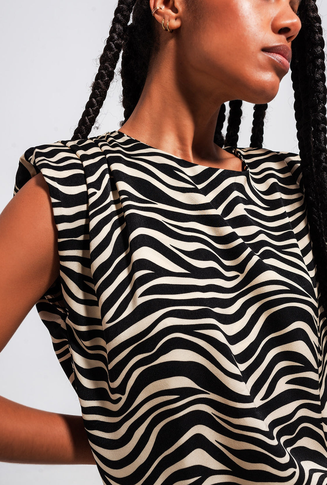 Zebra Print Sleeveless Top - Premium variable from Tooksie - Just $39.99! Shop now at Tooksie