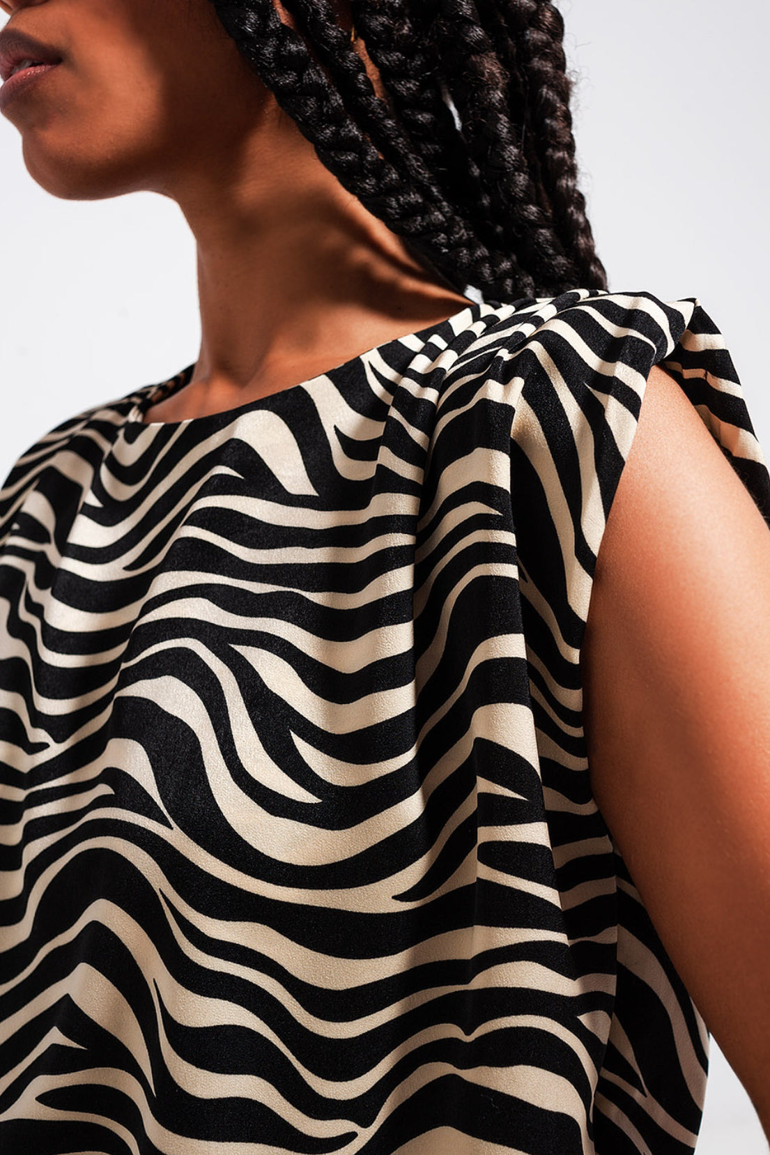 Zebra Print Sleeveless Top - Premium variable from Tooksie - Just $39.99! Shop now at Tooksie