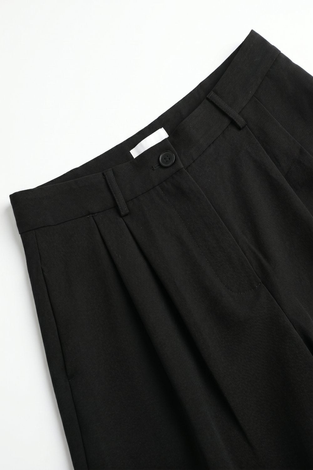 Black Tailored Pleated Bermuda Shorts - Premium variable from Tooksie - Just $79.90! Shop now at Tooksie