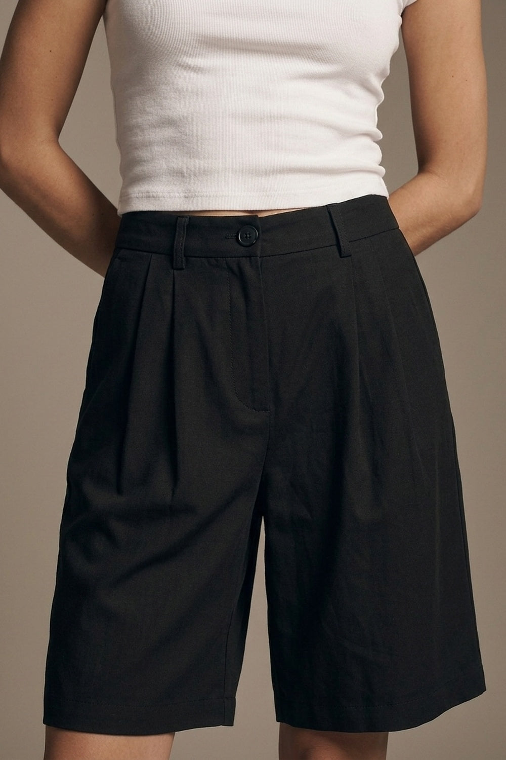 Black Tailored Pleated Bermuda Shorts - Premium variable from Tooksie - Just $79.90! Shop now at Tooksie