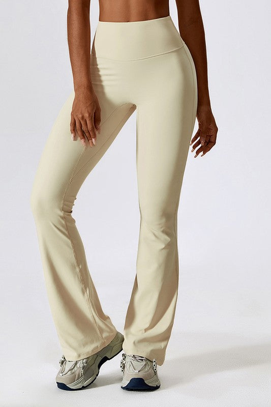 High-Rise Stretch Flared Yoga Pants - Premium variable from Tooksie - Just $46.99! Shop now at Tooksie