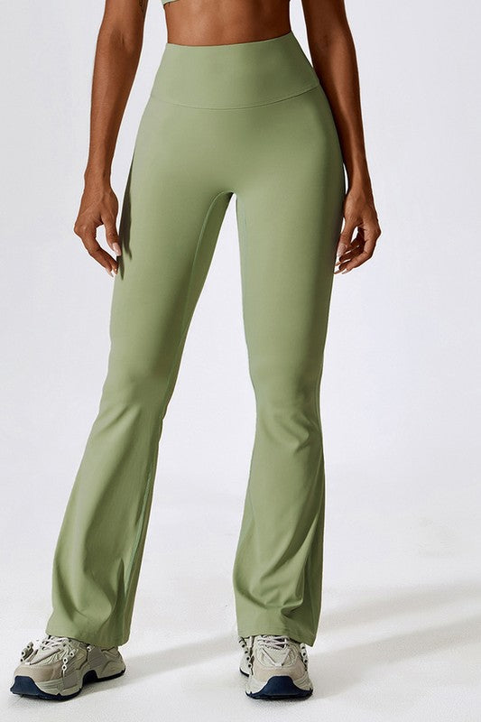 High-Rise Stretch Flared Yoga Pants - Premium variable from Tooksie - Just $46.99! Shop now at Tooksie
