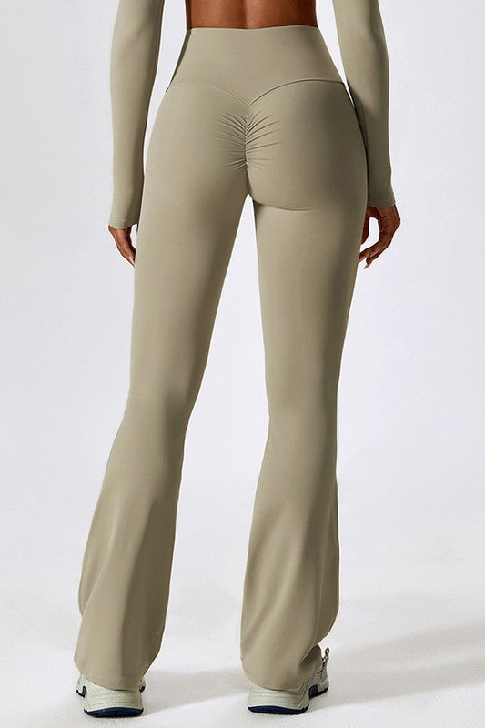 High-Rise Stretch Flared Yoga Pants - Premium variable from Tooksie - Just $46.99! Shop now at Tooksie