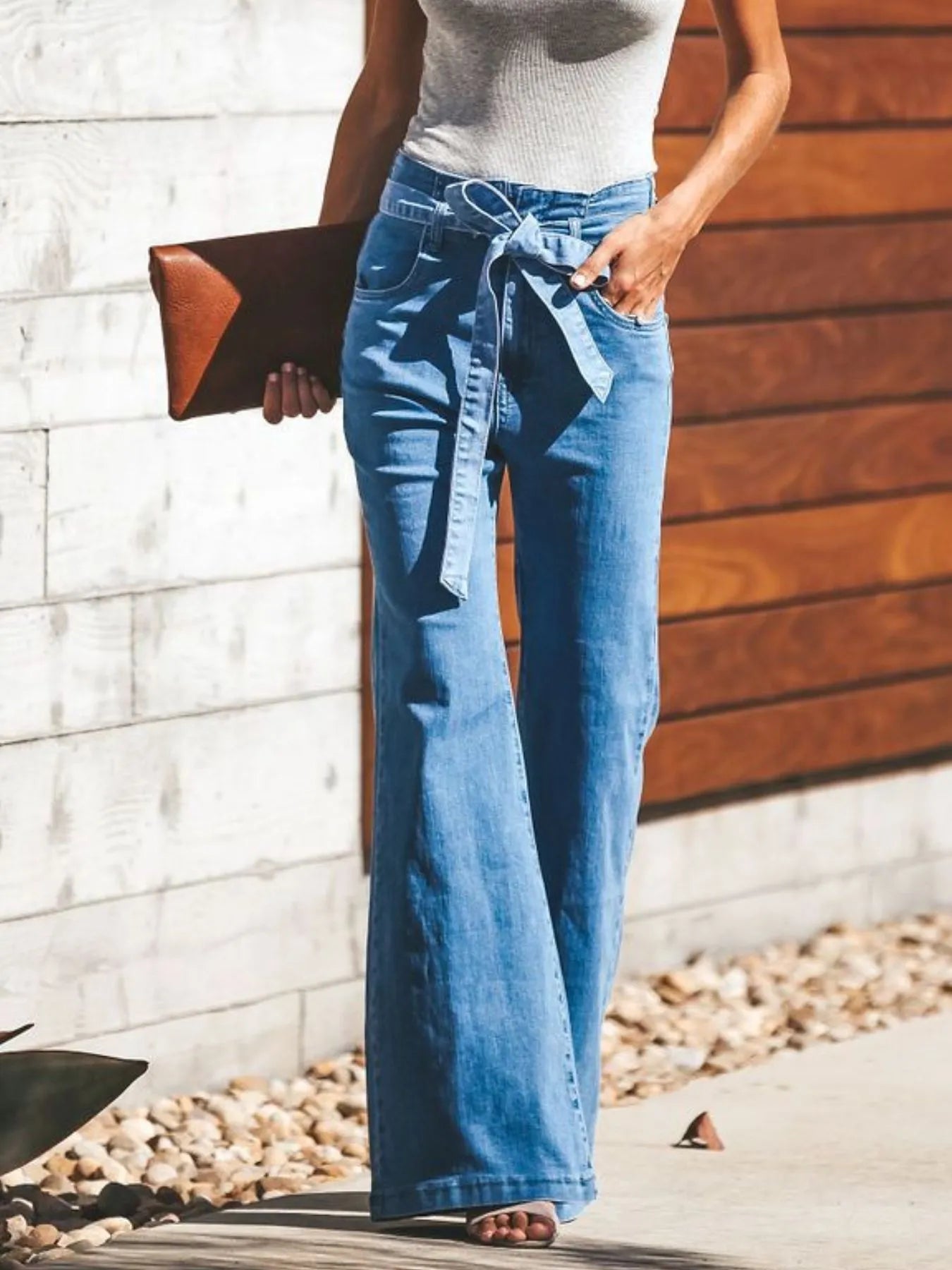 High-Waisted Tie-Front Flared Jeans - Premium variable from Tooksie - Just $50.99! Shop now at Tooksie