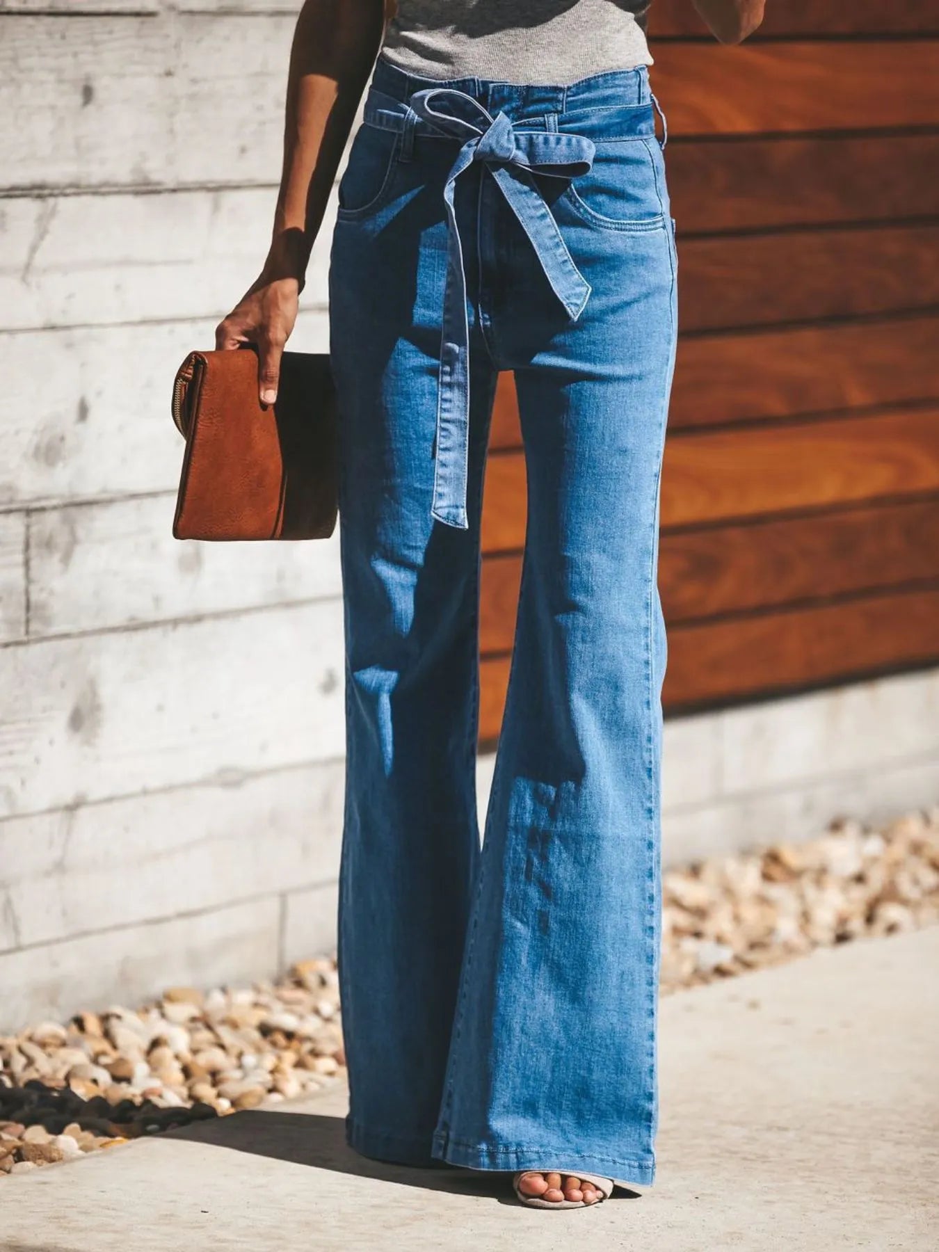 High-Waisted Tie-Front Flared Jeans - Premium variable from Tooksie - Just $50.99! Shop now at Tooksie