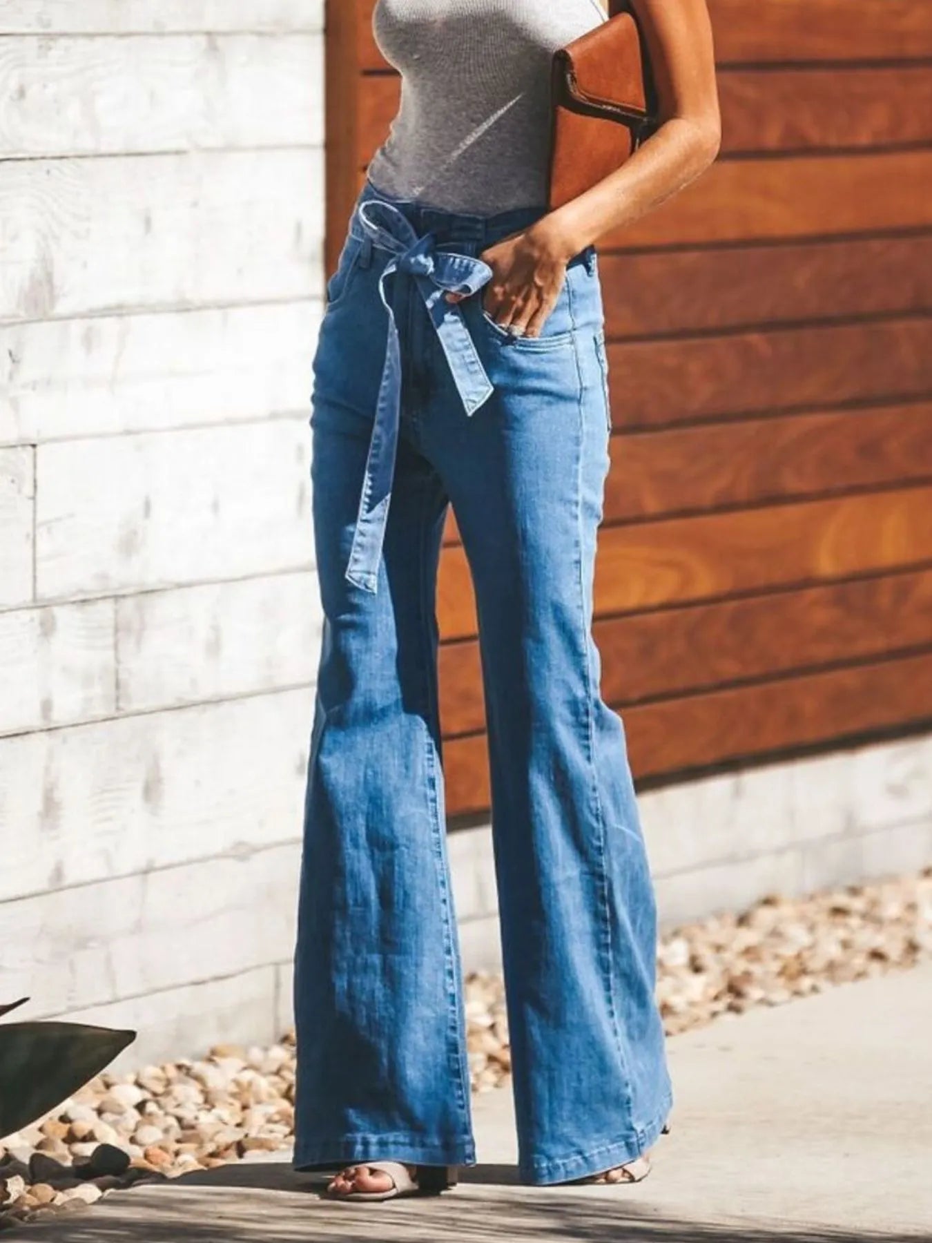 High-Waisted Tie-Front Flared Jeans - Premium variable from Tooksie - Just $50.99! Shop now at Tooksie
