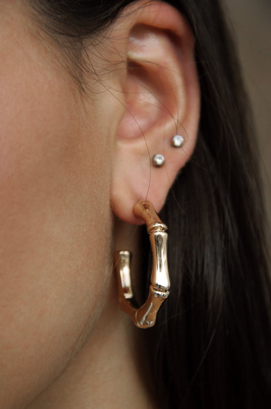 Golden Reign Hoop Earring Set - Premium Earrings from Ettika - Just $29.99! Shop now at Tooksie